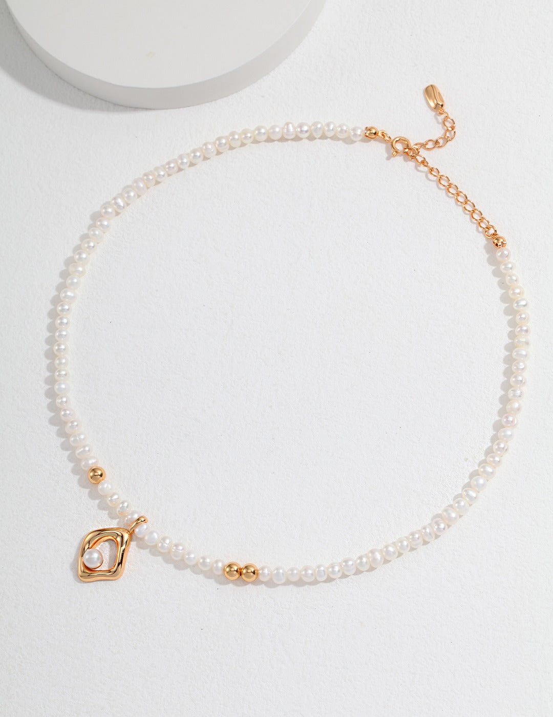 Asymmetric Gold Shape with Freshwater Pearl Necklace